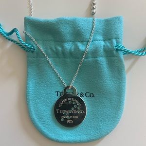 Tiffany & Co sterling silver Sagittarius disc necklace. 28 - 30” length.